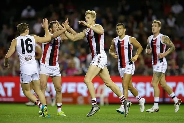 MELBOURNE, AUSTRALIA - APRIL 30: Nick Riewoldt of the Saints celebrates a goal with team mates during the 2016 AFL Round 06 match between the Melbourne Demons and the St Kilda Saints at Etihad Stadium, Melbourne on April 30, 2016. (Photo by Darrian Traynor/AFL Media)