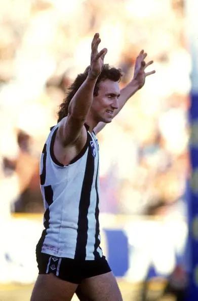 MELBOURNE, AUSTRALIA - 1990:  Peter Daicos of the Collingwood Magpies celebrates during a AFL match held at the Melbourne Cricket Ground in Melbourne, Australia. (Photo by Getty Images)