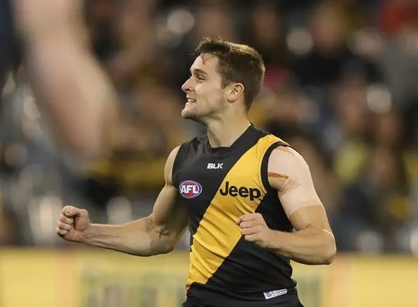 MELBOURNE, AUSTRALIA - MAY 06: Jayden Short of the Tigers celebrates a goal during the round seven AFL match between the Richmond Tigers and the Hawthorn Hawks at Melbourne Cricket Ground on May 6, 2016 in Melbourne, Australia. (Photo by Robert Cianflone/Getty Images)