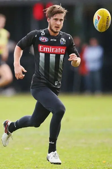 MELBOURNE, AUSTRALIA - JUNE 09: Tom Phillips of the Magpies runs for the ball during a Collingwood Magpies AFL media opportunity at the Glasshouse Theatre on June 9, 2016 in Melbourne, Australia. (Photo by Michael Dodge/Getty Images)