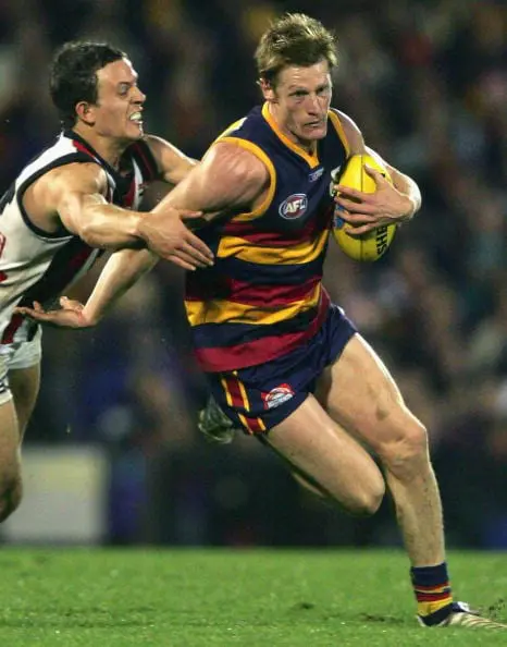 ADELAIDE, AUSTRALIA - SEPTEMBER 3: Ben Hart of the Crows and Luke Ball of the Saints during the AFL final qualifying round between the Adelaide Crows and the St Kilda Saints at AAMI Stadium September 3, 2005 in Adelaide, Australia. (Photo by James Knowler/Getty Images)