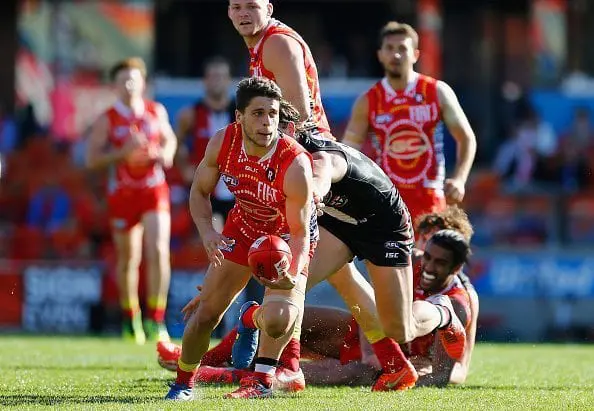 GOLD COAST, AUSTRALIA - JULY 02: Dion Prestia of the suns in action during the round 15 AFL match between the Gold Coast Suns and the St Kilda Saints at Metricon Stadium on July 2, 2016 in Gold Coast, Australia. (Photo by Jason O'Brien/Getty Images)