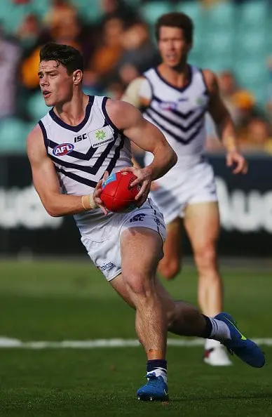 LAUNCESTON, AUSTRALIA - MAY 14: Lachie Neale of the Dockers runs with the ball during the round eight AFL match between the Hawthorn Hawks and the Fremantle Dockers at Aurora Stadium on May 14, 2016 in Launceston, Australia. (Photo by Michael Dodge/Getty Images)