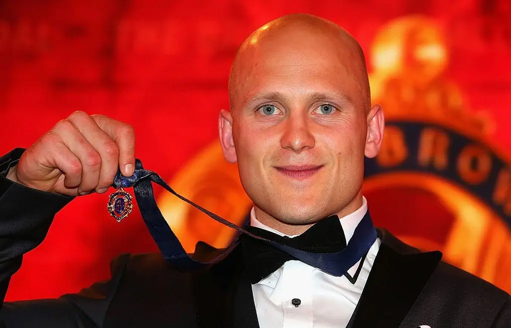 MELBOURNE, AUSTRALIA - SEPTEMBER 23: Gary Ablett of the Suns poses with the medal after winning the 2013 Brownlow Medal at Crown Palladium on September 23, 2013 in Melbourne, Australia. (Photo by Quinn Rooney/Getty Images)