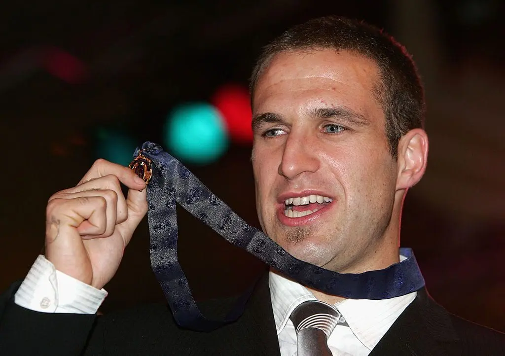 MELBOURNE, AUSTRALIA - SEPTEMBER 20: Chris Judd of the West Coast Eagles poses after winning the Brownlow Medal during the Brownlow Medal Dinner at the Crown Casino on September 20, 2004 in Melbourne, Australia. (Photo by Ryan Pierse/Getty Images)