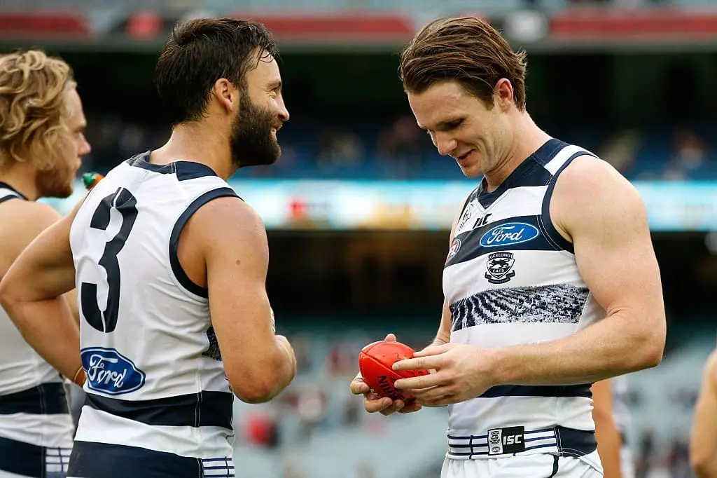 MELBOURNE, AUSTRALIA - APRIL 16: Jimmy Bartel (left) and Patrick Dangerfield of the Cats celebrate during the 2016 AFL Round 04 match between the Essendon Bombers and the Geelong Cats at the Melbourne Cricket Ground, Melbourne on April 16, 2016. (Photo by Adam Trafford/AFL Media/Getty Images)