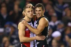 Saints pair re-sign