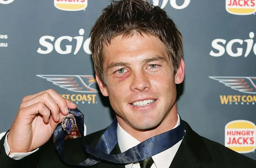 PERTH, AUSTRALIA - SEPTEMBER 19: Ben Cousins of the Eagles poses with the 2005 Brownlow Medal after being announced as the winner during the West Coast Eagles Brownlow Medal Dinner at the Burswood Casino September 19, 2005 in Perth, Australia.(Photo by Paul Kane/Getty Images)