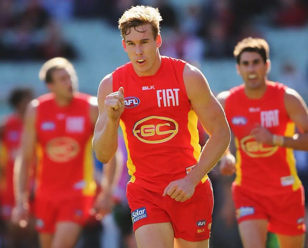 MELBOURNE, AUSTRALIA - JULY 31: Tom Lynch of the Suns celebrates a goal during the round 19 AFL match between the Melbourne Demons and the Gold Coast Suns at Melbourne Cricket Ground on July 31, 2016 in Melbourne, Australia. (Photo by Michael Dodge/Getty Images)