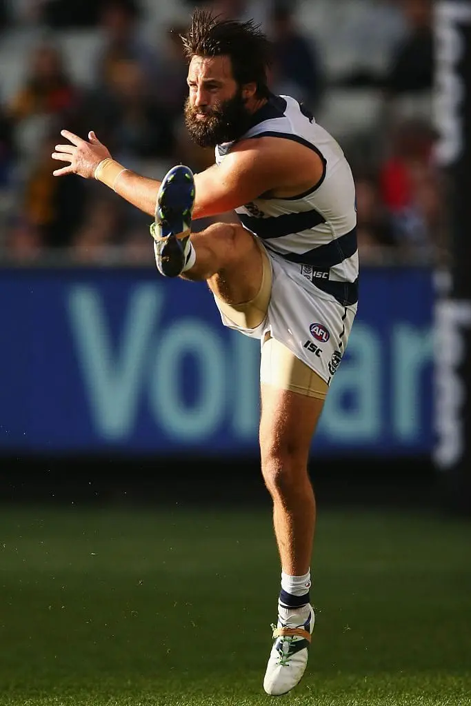 MELBOURNE, AUSTRALIA - AUGUST 14: Jimmy Bartel of the Cats kicks the ball during the round 21 AFL match between the Richmond Tigers and the Geelong Cats at Melbourne Cricket Ground on August 14, 2016 in Melbourne, Australia.  (Photo by Michael Dodge/Getty Images)