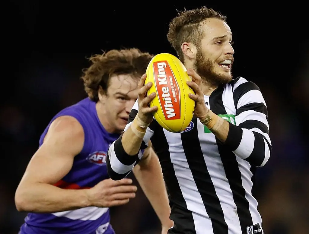 MELBOURNE, AUSTRALIA - AUGUST 12: James Aish of the Magpies in action during the 2016 AFL Round 21 match between the Western Bulldogs and the Collingwood Magpies at Etihad Stadium on August 12, 2016 in Melbourne, Australia. (Photo by Adam Trafford/AFL Media/Getty Images)