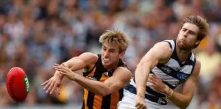 Cats duo re-sign