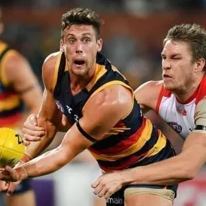 Hartigan re-commits to Crows