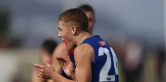 North Melbourne young gun Tom Powell re-signs