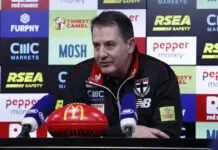 Ross Lyon berates Marvel Stadium ground management, commends maligned star