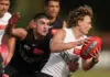 Collingwood defender suffers hip injury at training Delisted Collingwood midfielder finds new home