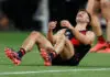 Essendon coach's humane moment with forward following ANZAC Day classic