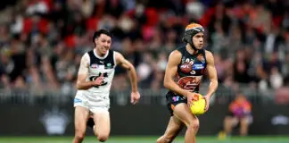 Michael Voss to reward "good form" at selection table, takes aim at shaky defence
