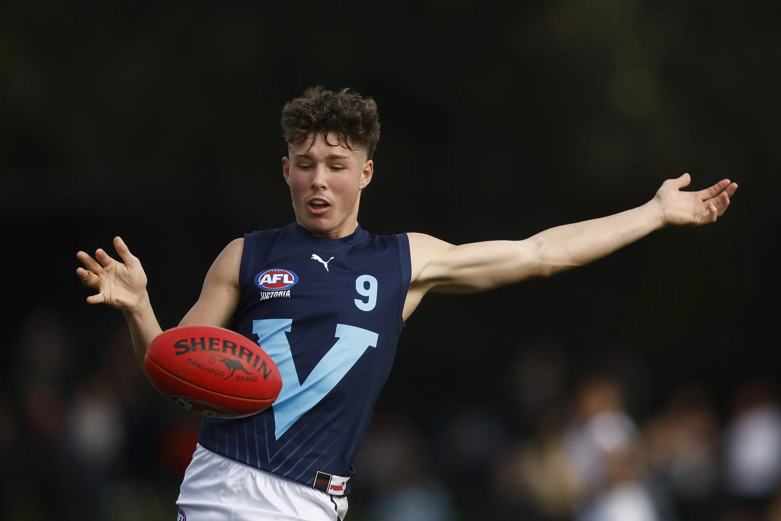 MELBOURNE, AUSTRALIA - JUNE 10: Mitchell Moate of Victoria Metro kicks the ball during the AFL National Development Championships U16 match between Victoria Country and Victoria Metro at Trevor Barker Beach Oval on June 10, 2023 in Melbourne, Australia. (Photo by Daniel Pockett/AFL Photos/via Getty Images)