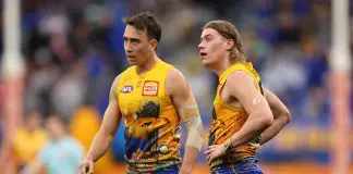 PERTH, AUSTRALIA - JULY 14: Brady Hough and Harley Reid of the Eagles look on during the round 18 AFL match between West Coast Eagles and Brisbane Lions at Optus Stadium, on July 14, 2024, in Perth, Australia. (Photo by Paul Kane/Getty Images)