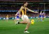 MELBOURNE, AUSTRALIA - SEPTEMBER 06: Finn Maginness of the Hawks kicks the ball during the 2024 AFL Second Elimination Final match between the Western Bulldogs and the Hawthorn Hawks at The Melbourne Cricket Ground on September 06, 2024 in Melbourne, Australia. (Photo by Michael Willson/AFL Photos via Getty Images)