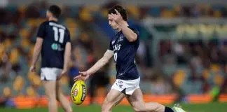 BRISBANE, AUSTRALIA - SEPTEMBER 07: Corey Durdin of the Blues warms up prior to the 2024 AFL First Elimination Final match between the Brisbane Lions and the Carlton Blues at The Gabba on September 07, 2024 in Brisbane, Australia. (Photo by Russell Freeman/AFL Photos via Getty Images)