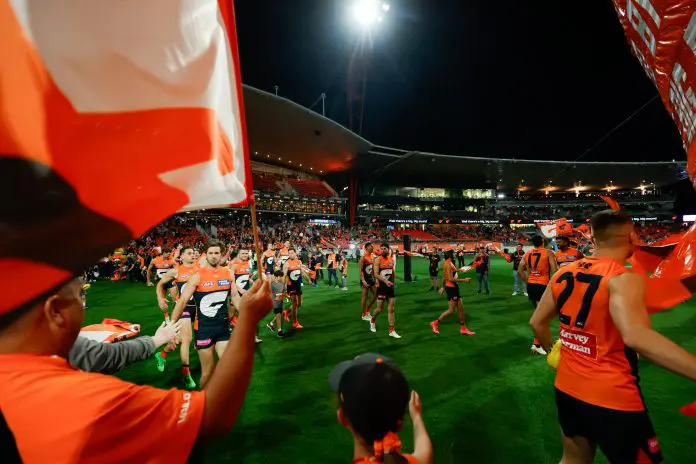 SYDNEY, AUSTRALIA - SEPTEMBER 14: The GWS Giants enter the field during the 2024 AFL First Semi Final match between the GWS GIANTS and the Brisbane Lions at ENGIE Stadium on September 14, 2024 in Sydney, Australia. (Photo by Dylan Burns/AFL Photos via Getty Images)