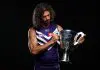 MELBOURNE, AUSTRALIA - FEBRUARY 24: Alex Pearce of the Dockers poses with the Premiership Cup during the 2025 AFL Captains Day at Marvel Stadium on February 24, 2025 in Melbourne, Australia. (Photo by Michael Willson/AFL Photos via Getty Images)