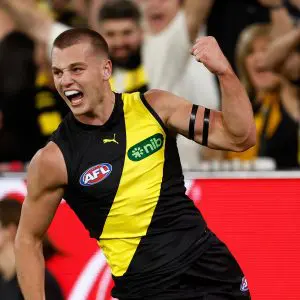 MELBOURNE, AUSTRALIA - MARCH 13: Debutant, Sam Lalor of the Tigers celebrates his first league goal during the 2025 AFL Round 01 match between the Richmond Tigers and the Carlton Blues at the Melbourne Cricket Ground on March 13, 2025 in Melbourne, Australia. (Photo by Michael Willson/AFL Photos)