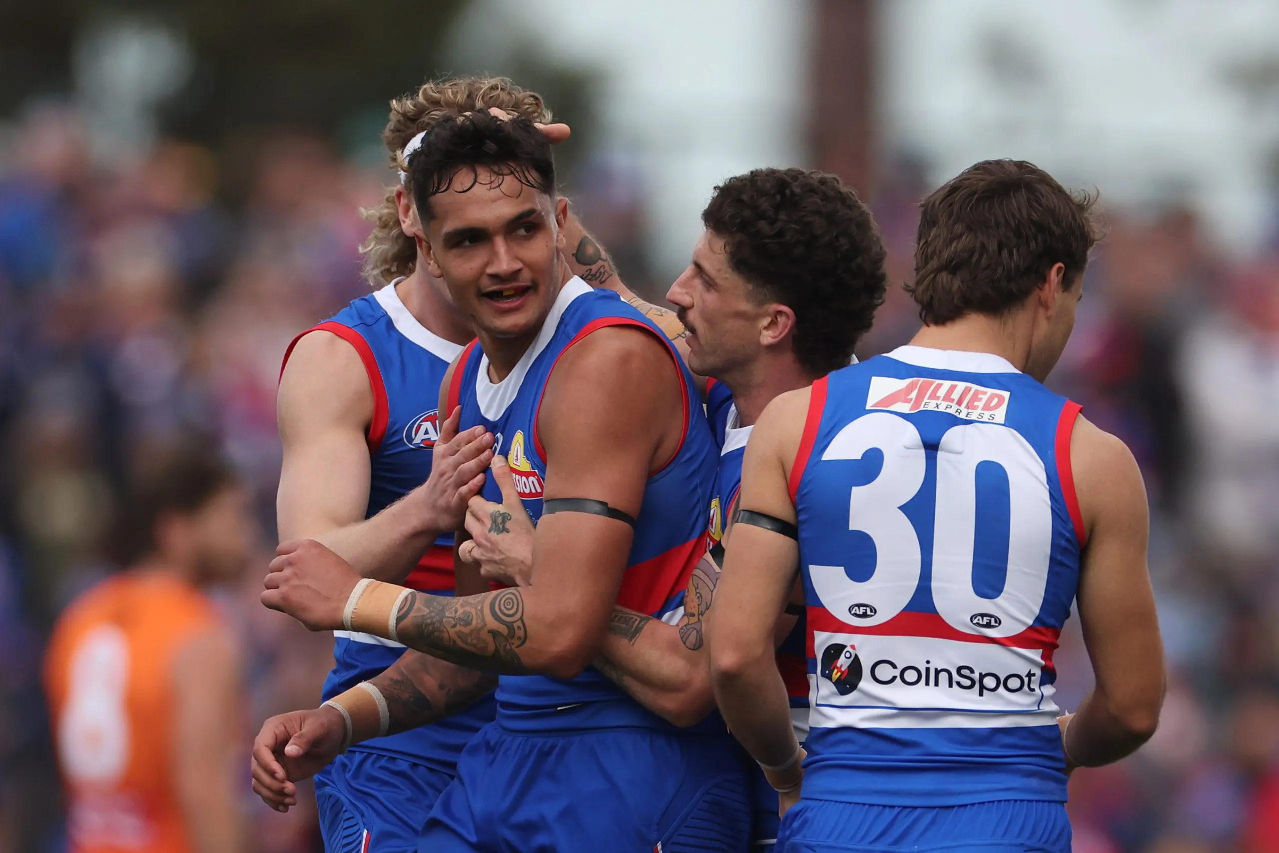 BALLARAT, AUSTRALIA - AUGUST 25: Jamarra Ugle-Hagan of the Bulldogs is congratulated by w21during the round 24 AFL match between Western Bulldogs and Greater Western Sydney Giants at Mars Stadium, on August 25, 2024, in Ballarat, Australia. (Photo by Daniel Pockett/Getty Images)