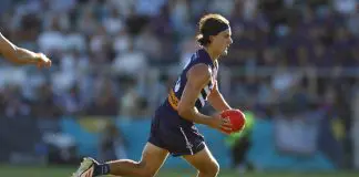 PERTH, AUSTRALIA - MARCH 02: Murphy Reid of the Dockers runs across the ground during the 2025 AAMI AFL Community Series match between Fremantle Dockers and Melbourne Demons at Rushton Park on March 02, 2025 in Mandurah, Australia. (Photo by James Worsfold/AFL Photos/via Getty Images)