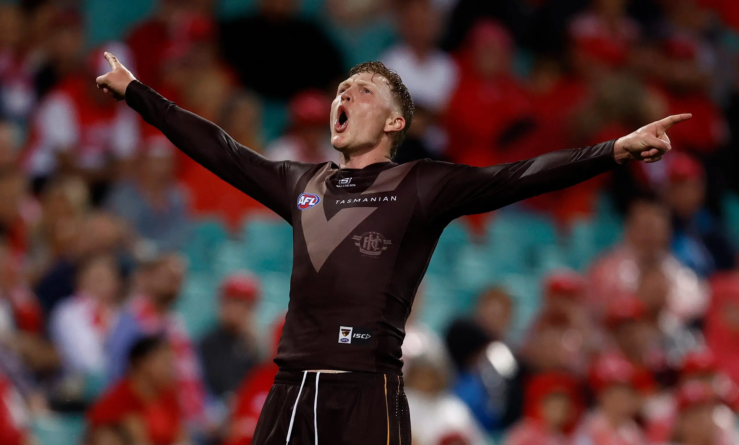 SYDNEY, AUSTRALIA - MARCH 07: James Sicily of the Hawks celebrates a goal during the 2025 AFL Opening Round match between the Sydney Swans and the Hawthorn Hawks at the Sydney Cricket Ground on March 7, 2025 in Sydney, Australia. (Photo by Michael Willson/AFL Photos via Getty Images)