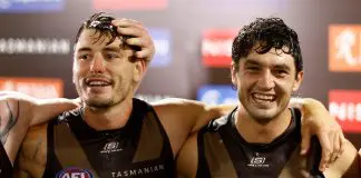 SYDNEY, AUSTRALIA - MARCH 07: Josh Battle and Tom Barrass of the Hawks sing the team song during the 2025 AFL Opening Round match between the Sydney Swans and the Hawthorn Hawks at the Sydney Cricket Ground on March 7, 2025 in Sydney, Australia. (Photo by Michael Willson/AFL Photos via Getty Images)