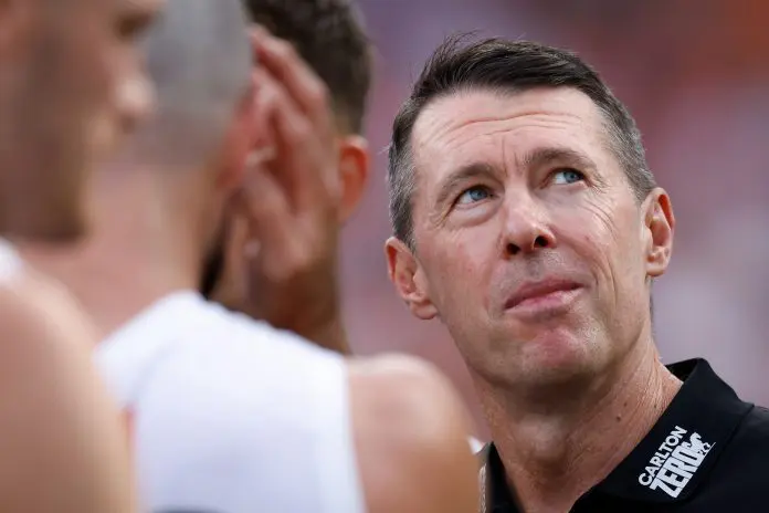 SYDNEY, AUSTRALIA - MARCH 09: Craig McRae, Senior Coach of the Magpies addresses his players during the 2025 AFL Opening Round match between the GWS Giants and the Collingwood Magpies at ENGIE Stadium on March 9, 2025 in Sydney, Australia. (Photo by Dylan Burns/AFL Photos via Getty Images)