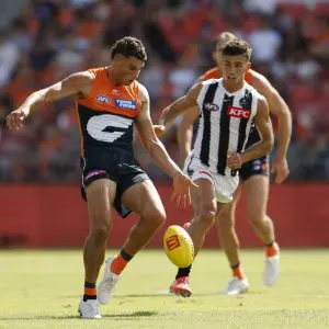 SYDNEY, AUSTRALIA - MARCH 09: Finn Callaghan of the Giants kicks the ball during the AFL Opening Round match between Greater Western Sydney Giants and Collingwood Magpies at ENGIE Stadium, on March 09, 2025, in Sydney, Australia. (Photo by Darrian Traynor/Getty Images)
