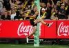 MELBOURNE, AUSTRALIA - MARCH 13: Debutant, Sam Lalor of the Tigers kicks his first league goal during the 2025 AFL Round 01 match between the Richmond Tigers and the Carlton Blues at the Melbourne Cricket Ground on March 13, 2025 in Melbourne, Australia. (Photo by Michael Willson/AFL Photos via Getty Images)