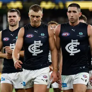 MELBOURNE, AUSTRALIA - MARCH 13: Patrick Cripps (left) and Jacob Weitering of the Blues look dejected after a loss during the 2025 AFL Round 01 match between the Richmond Tigers and the Carlton Blues at the Melbourne Cricket Ground on March 13, 2025 in Melbourne, Australia. (Photo by Michael Willson/AFL Photos via Getty Images)