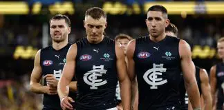 MELBOURNE, AUSTRALIA - MARCH 13: Patrick Cripps (left) and Jacob Weitering of the Blues look dejected after a loss during the 2025 AFL Round 01 match between the Richmond Tigers and the Carlton Blues at the Melbourne Cricket Ground on March 13, 2025 in Melbourne, Australia. (Photo by Michael Willson/AFL Photos via Getty Images)