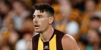 MELBOURNE, AUSTRALIA - MARCH 14: Josh Battle of the Hawks in action during the 2025 AFL Round 01 match between the Hawthorn Hawks and the Essendon Bombers at the Melbourne Cricket Ground on March 14, 2025 in Melbourne, Australia. (Photo by Michael Willson/AFL Photos via Getty Images)