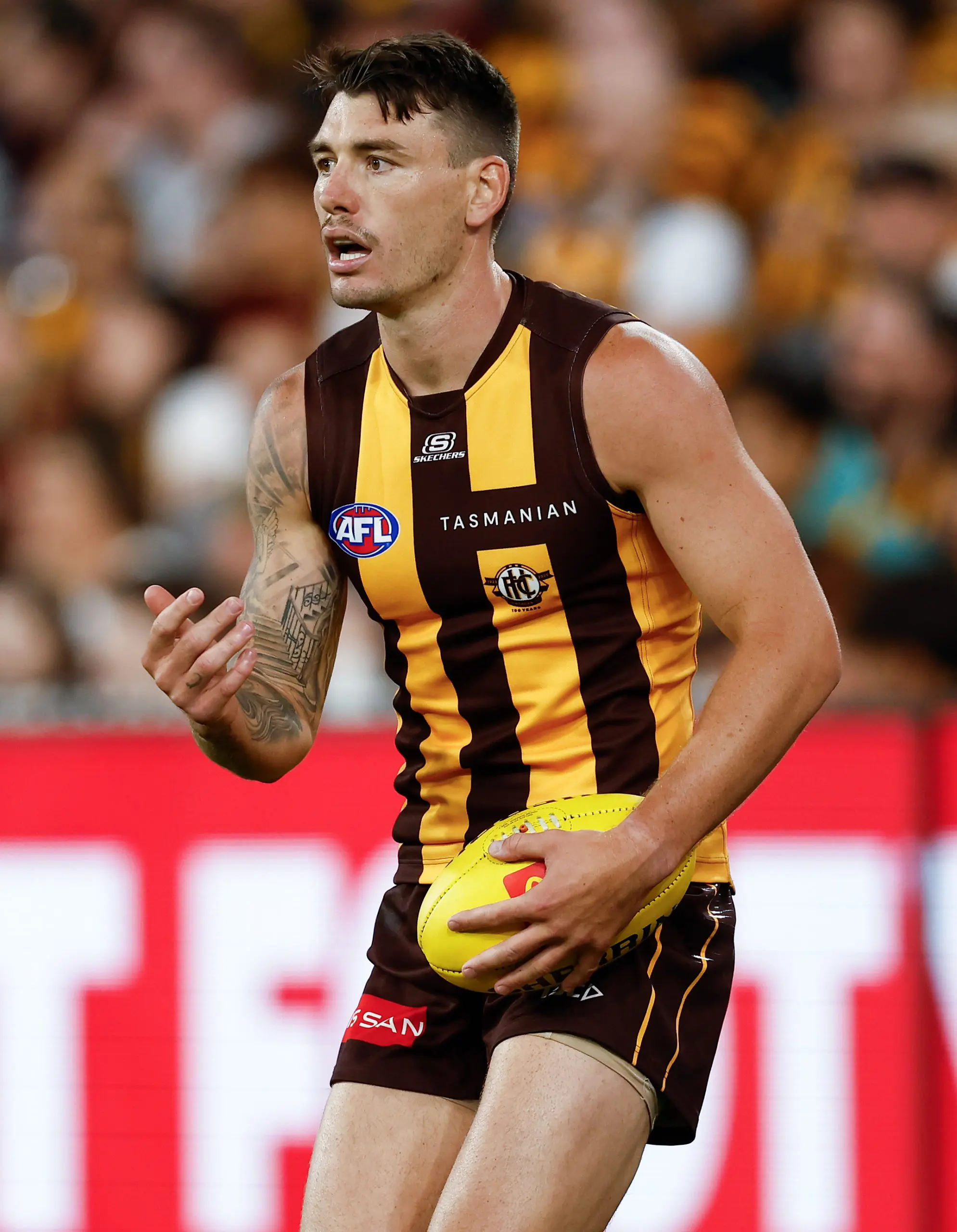 MELBOURNE, AUSTRALIA - MARCH 14: Josh Battle of the Hawks in action during the 2025 AFL Round 01 match between the Hawthorn Hawks and the Essendon Bombers at the Melbourne Cricket Ground on March 14, 2025 in Melbourne, Australia. (Photo by Michael Willson/AFL Photos via Getty Images)