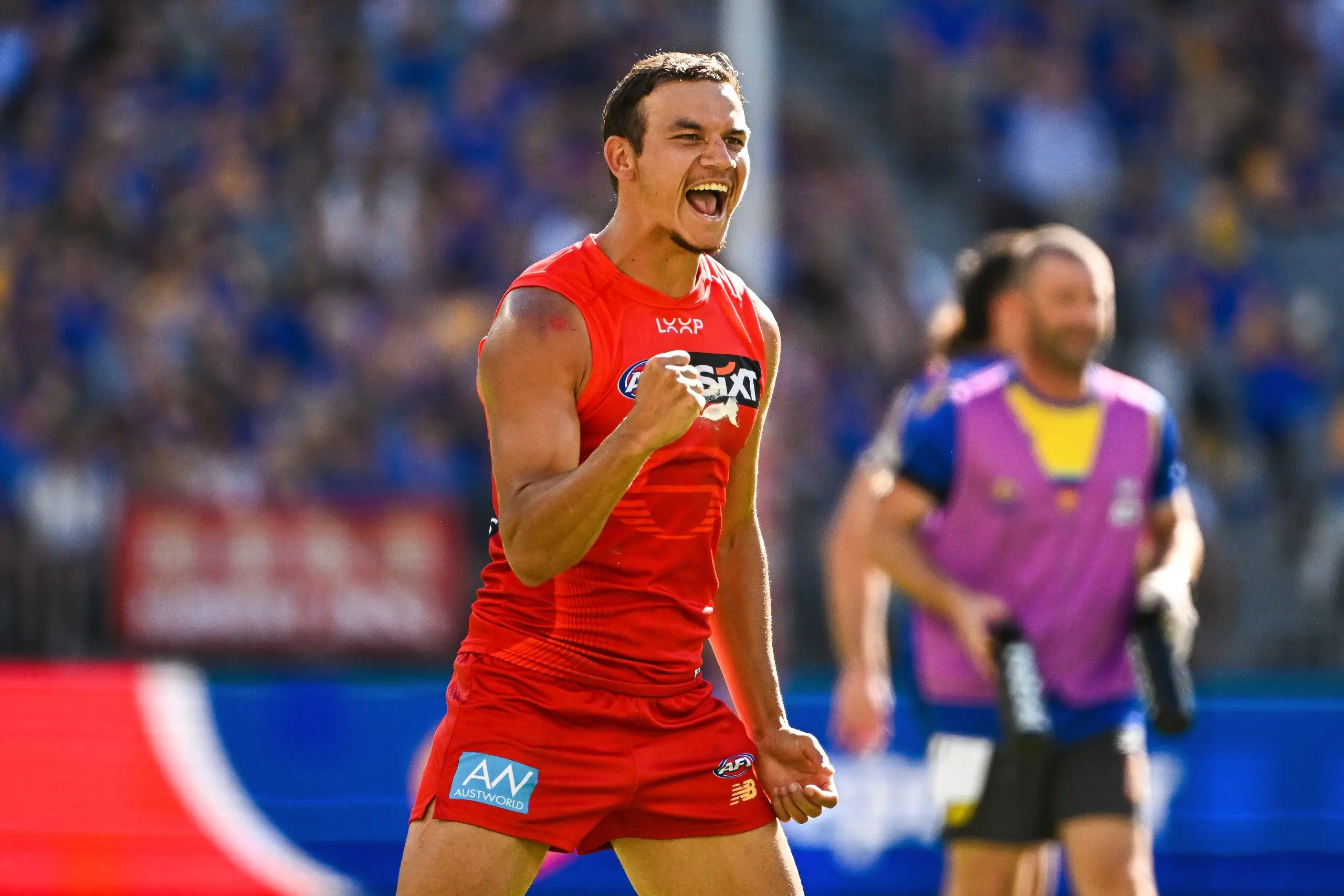 PERTH, AUSTRALIA - MARCH 16: Daniel Rioli of the Suns celebrates a goal during the 2025 AFL Round 01 match between the West Coast Eagles and the Gold Coast Suns at Optus Stadium on March 16, 2025 in Perth, Australia. (Photo by Daniel Carson/AFL Photos via Getty Images)