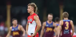 SYDNEY, AUSTRALIA - MARCH 15: Corey Warner of the Swans looks dejected after losing the round one AFL match between Sydney Swans and Brisbane Lions at Sydney Cricket Ground, on March 15, 2025, in Sydney, Australia. (Photo by Cameron Spencer/Getty Images)