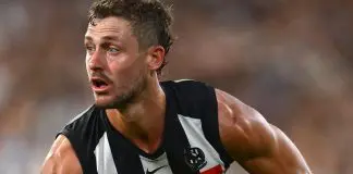 Collingwood, Hawthorn count injury cost from draw MELBOURNE, AUSTRALIA - MARCH 15: Harry Perryman of the Magpies handballs during the round one AFL match between Collingwood Magpies and Port Adelaide Power at Melbourne Cricket Ground, on March 15, 2025, in Melbourne, Australia. (Photo by Quinn Rooney/Getty Images)