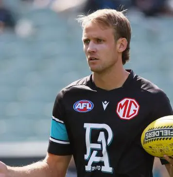 AFL injury news: Western Bulldog defender, Power utility sidelined ADELAIDE, AUSTRALIA - MARCH 22: Jack Lukosius of the Power warms up during the 2025 AFL Round 02 match between the Port Adelaide Power and the Richmond Tigers at Adelaide Oval on March 22, 2025 in Adelaide, Australia. (Photo by James Elsby/AFL Photos via Getty Images)