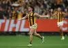 MELBOURNE, AUSTRALIA - MARCH 20: Nick Watson of the Hawks celebrates kicking a goal during the round two AFL match between Carlton Blues and Hawthorn Hawks at Melbourne Cricket Ground on March 20, 2025, in Melbourne, Australia. (Photo by Robert Cianflone/Getty Images)