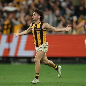 MELBOURNE, AUSTRALIA - MARCH 20: Nick Watson of the Hawks celebrates kicking a goal during the round two AFL match between Carlton Blues and Hawthorn Hawks at Melbourne Cricket Ground on March 20, 2025, in Melbourne, Australia. (Photo by Robert Cianflone/Getty Images)