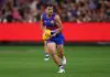 MELBOURNE, AUSTRALIA - MARCH 21: Matthew Kennedy of the Bulldogs takes possession of the ball during the round two AFL match between Footscray Bulldogs (Western Bulldogs) and Collingwood Magpies at Melbourne Cricket Ground, on March 21, 2025, in Melbourne, Australia. (Photo by Morgan Hancock/AFL Photos/Getty Images)