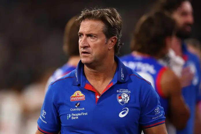 MELBOURNE, AUSTRALIA - MARCH 21: Luke Beveridge, Head Coach of the Bulldogs watches on during the round two AFL match between Footscray Bulldogs (Western Bulldogs) and Collingwood Magpies at Melbourne Cricket Ground, on March 21, 2025, in Melbourne, Australia. (Photo by Morgan Hancock/AFL Photos/Getty Images)