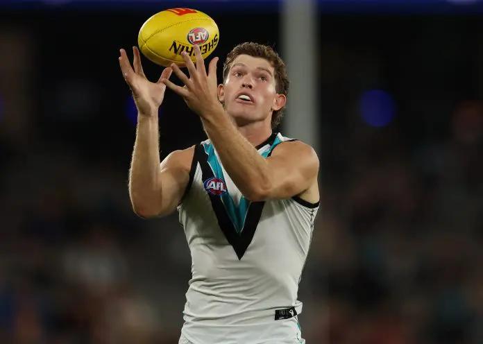 MELBOURNE, AUSTRALIA - MARCH 27: Mitch Georgiades of the Power controls the ball during the round three AFL match between Essendon Bombers and Port Adelaide Power at Marvel Stadium, on March 27, 2025, in Melbourne, Australia. (Photo by Robert Cianflone/Getty Images)
