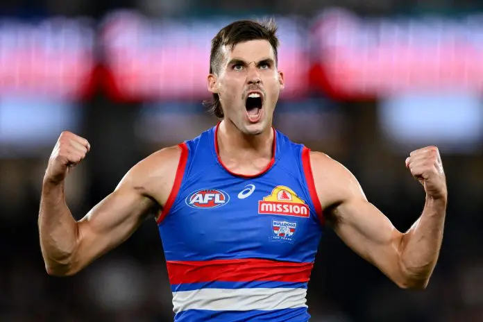 MELBOURNE, AUSTRALIA - MARCH 28: Sam Darcy of the Bulldogs celebrates kicking a goal during the round three AFL match between Carlton Blues and Western Bulldogs at Marvel Stadium, on March 28, 2025, in Melbourne, Australia. (Photo by Quinn Rooney/Getty Images)